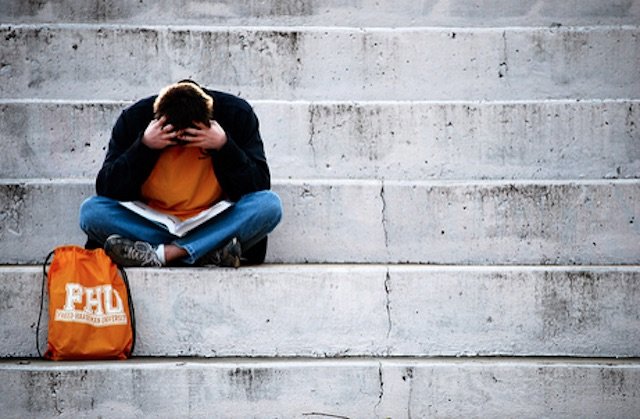Click to enlarge Studying student
