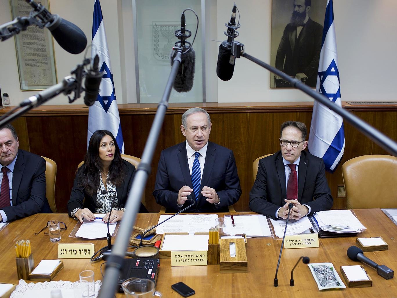 Benjamin Netanyahu faced questions over his role in an Israeli deal to buy submarines from a company partly owned by Iran 