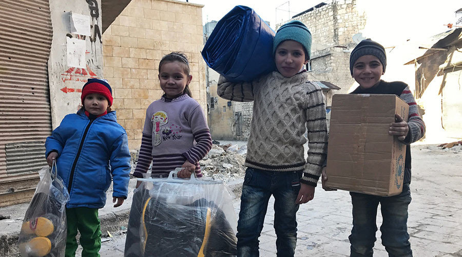 Children receive the first humanitarian aid in eastern Aleppo