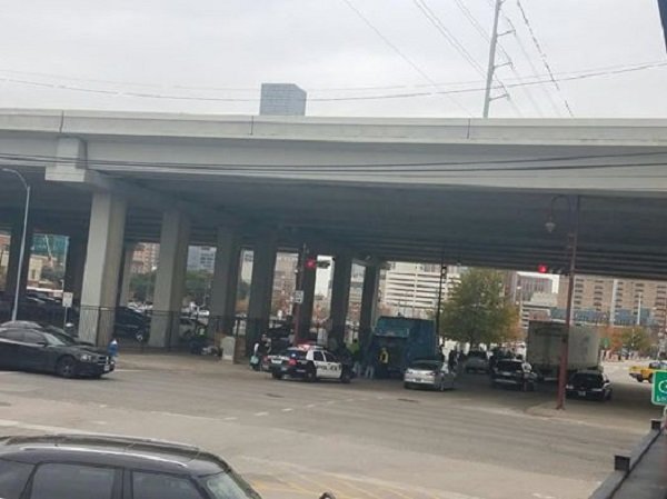 Houston police force homeless to throw away food
