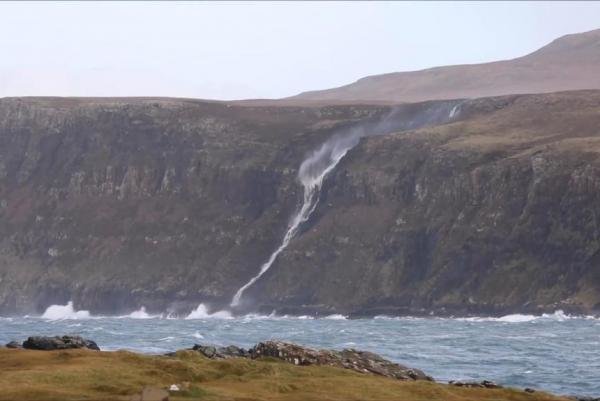 An amazing video has emerged of a waterfall being blown backward by strong winds last weekend.