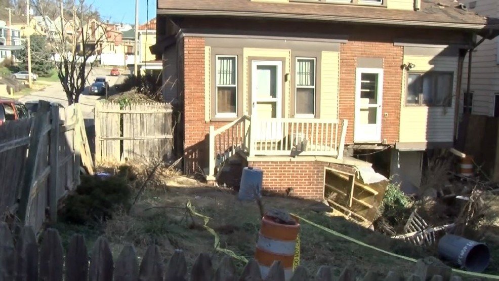 Click to enlarge House collapsed into sinkhole