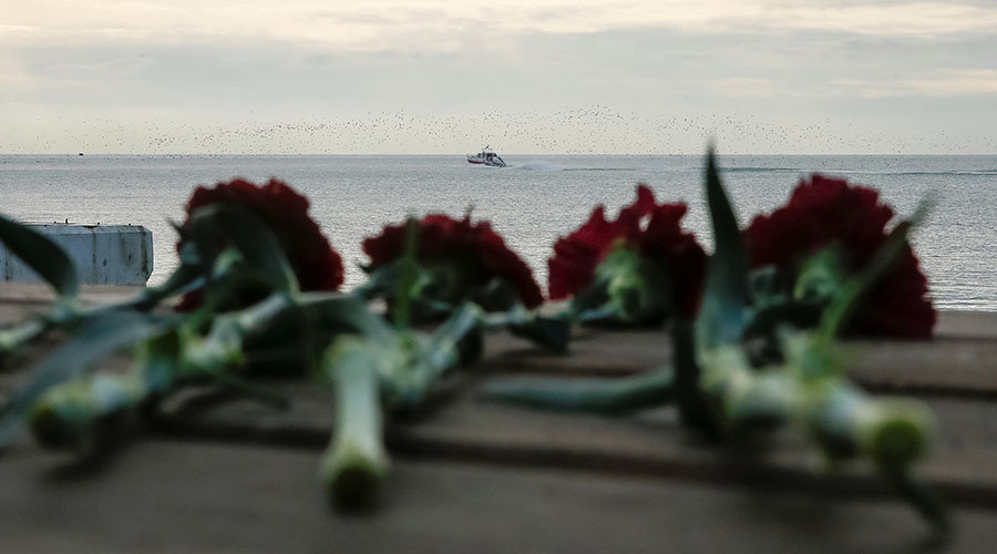 Flowers on a pier near the crash site of a Russian military Tu-154 planeFlowers on a pier near the crash site of a Russian military Tu-154 plane