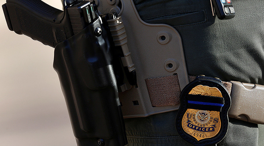 Police officer with gun