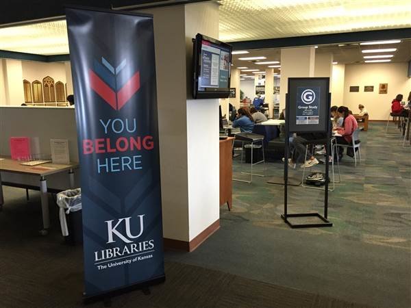 Click to enlarge sign advertising the University of Kansas Libraries'