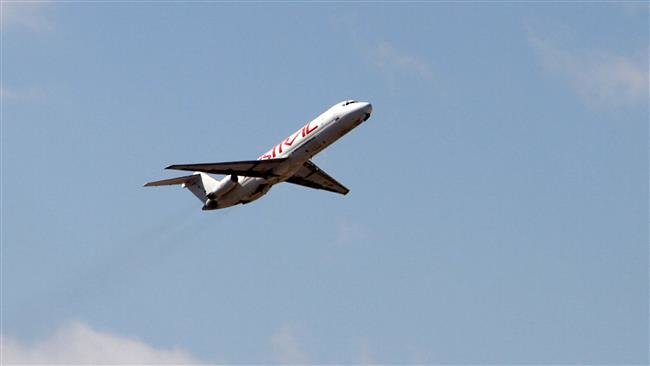 This file photo shows a plane flying after take-off from Yemen's Aden International Airport