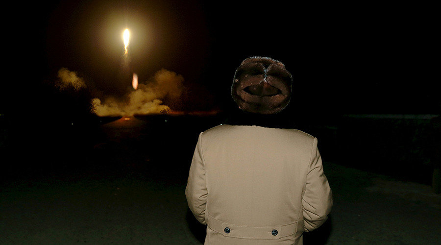 North Korean leader Kim Jong Un watches the ballistic rocket launch