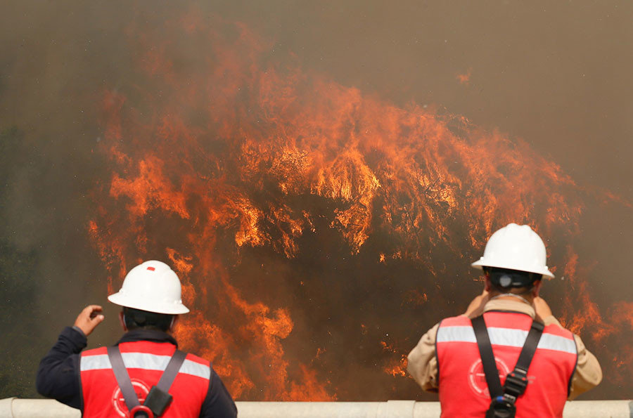 Fire is seen on a hill, where more than 100 homes were burned due to forest fire but there have been no reports of death, local authorities said in Valparaiso, Chile January 2, 2017