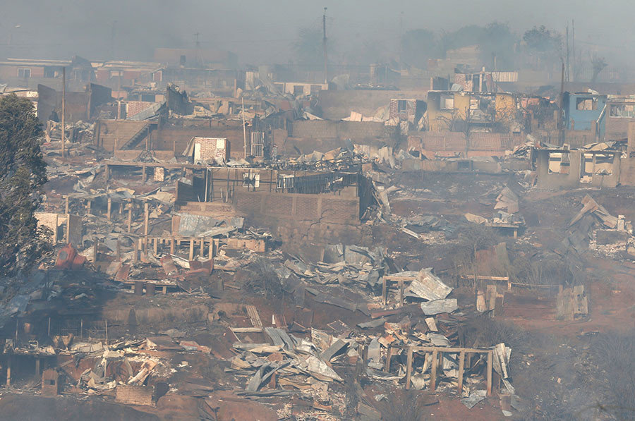 Destroyed houses are seen on a hill, where more than 100 homes were burned due to a forest fire but there have been no reports of death, local authorities said in Valparaiso, Chile January 2, 2017