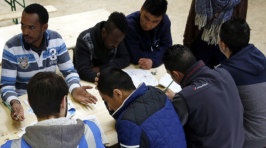 Migrants in a Swiss Federal refugee center