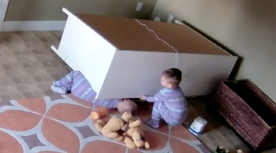 child saves trapped twin