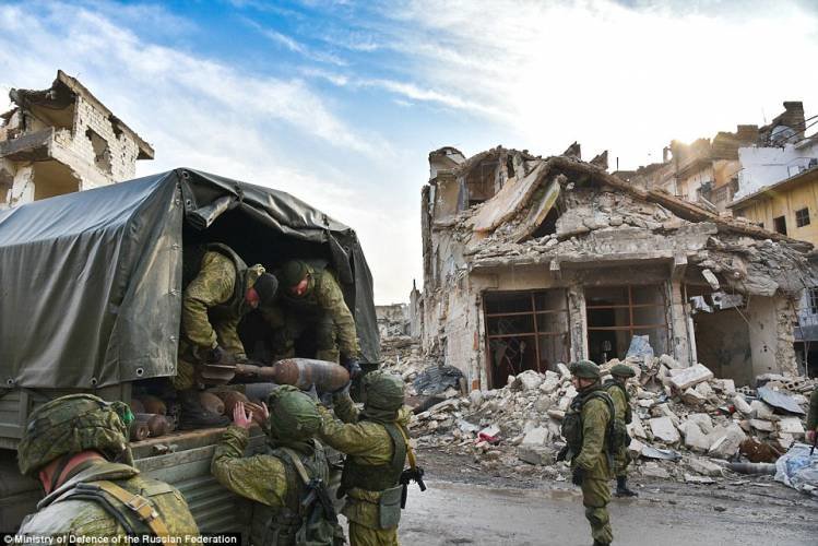 Click to enlarge russians clearing weapons aleppo