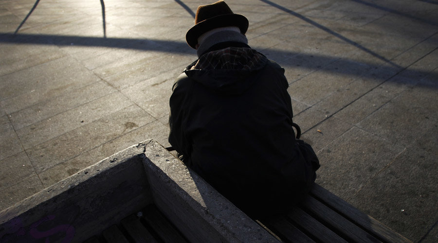 man sitting bench