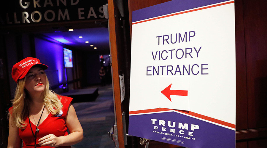 Click to enlarge Trump supporter waits outside of the rally