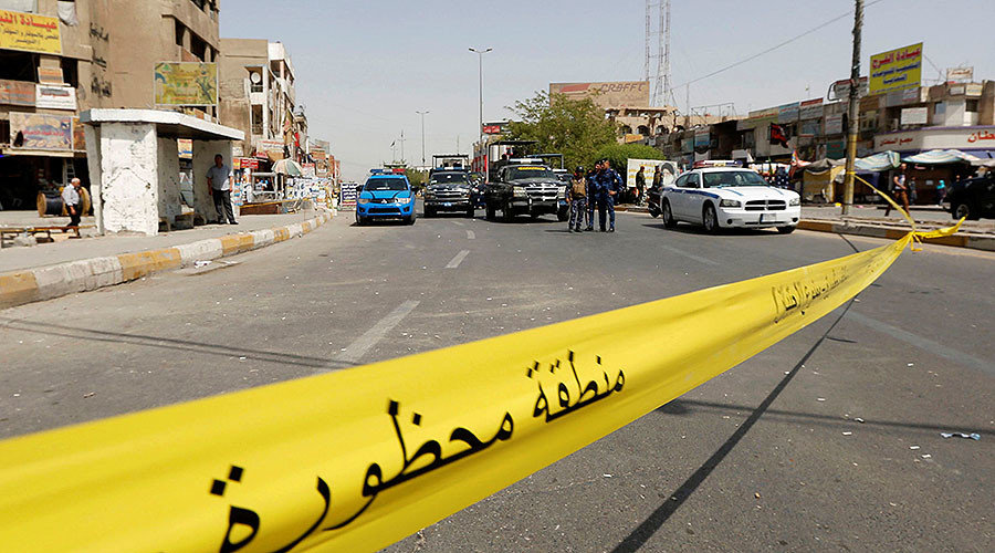 A police tape cordons the site of a suicide bomb blast in Baghdad
