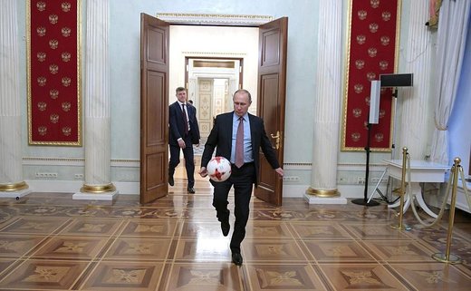 Click to enlarge Putin kicks the ball