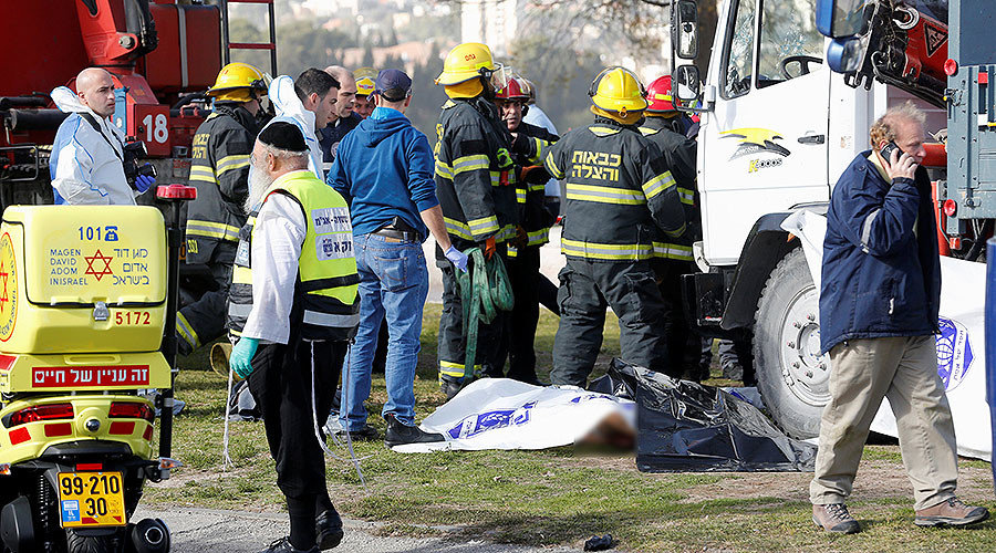 Israeli rescue forces work at the scene of a truck ramming incident in Jerusalem