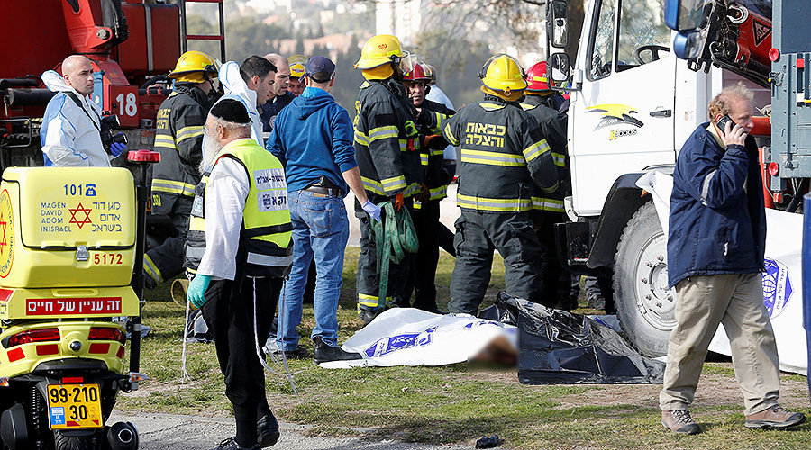 Click to enlarge Israeli rescue forces work at the scene of a truck ramming incident in Jerusalem