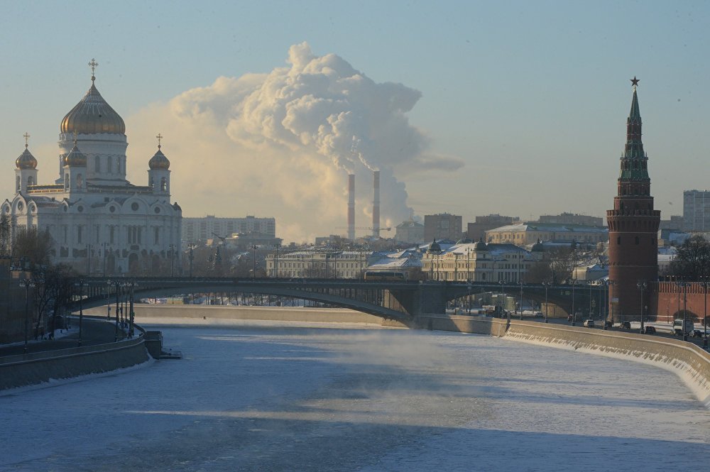 The Moskva River and the Kremlin Embankment on a freezing cold day (the temperature has fallen to minus 27°С). The Cathedral of Christ the Savior is seen on the left. The Moscow Kremlin's Vodovzvodnaya Tower, right, and Bolshoi Kamenny Bridge, center. 
