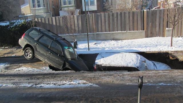 Fishtown sinkhole swallows two cars