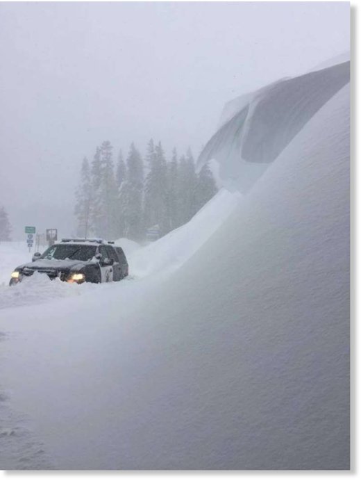 The CHP Turckee office shared this photo of a patrol vehicle parked next to a snow hill along I-80.