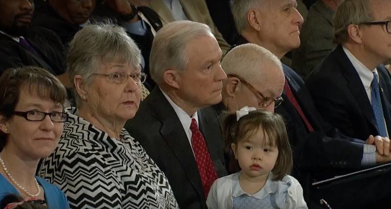 Click to enlarge Sessions and granddaughter