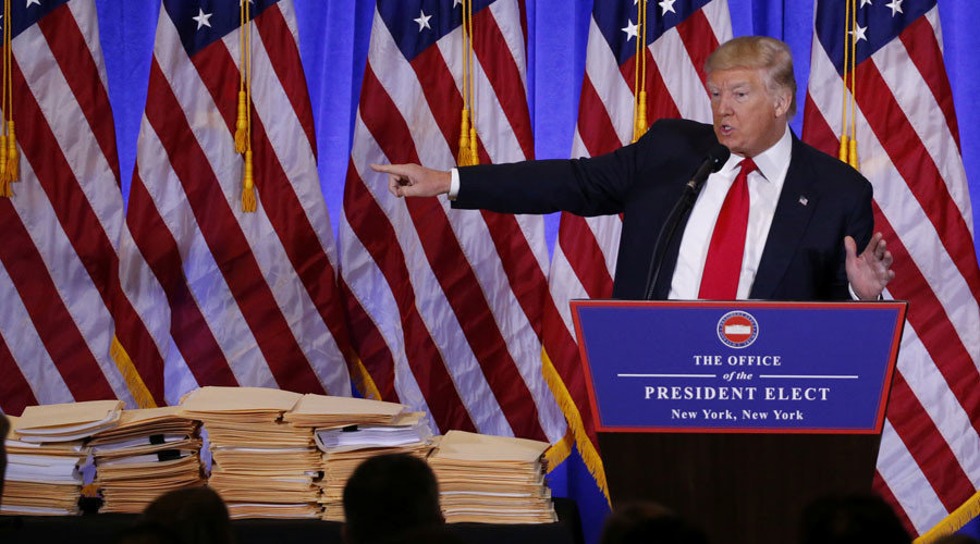 Click to enlarge Donald Trump speaks during a news conference