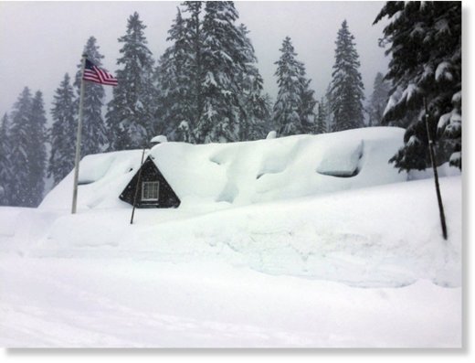  This Tuesday, Jan. 10, 2017 photo provided by the U.S. National Park Service shows the Crater Lake National Park visitor center in Oregon buried in snow up to the eaves as severe weather forced the southern Oregon park's closure. 