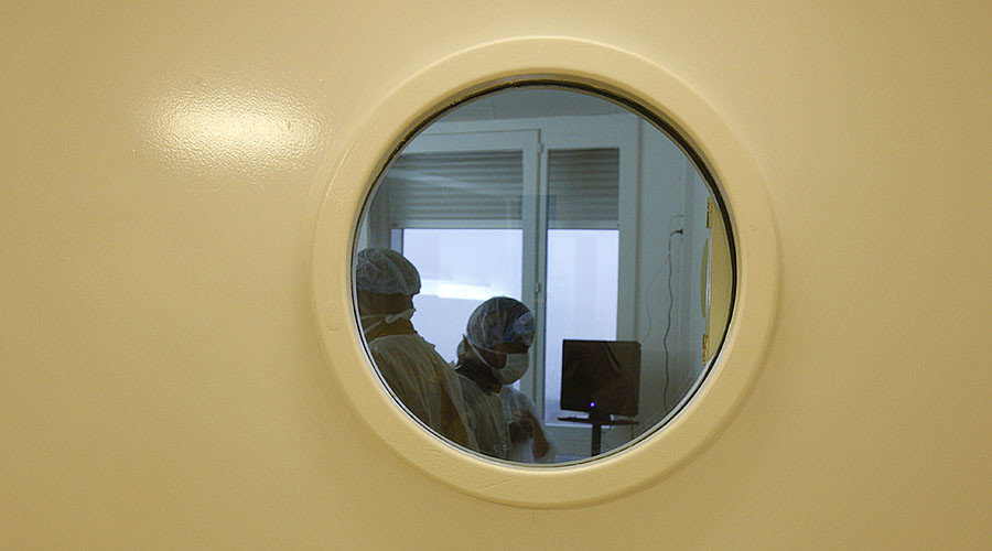 Click to enlarge lab workers