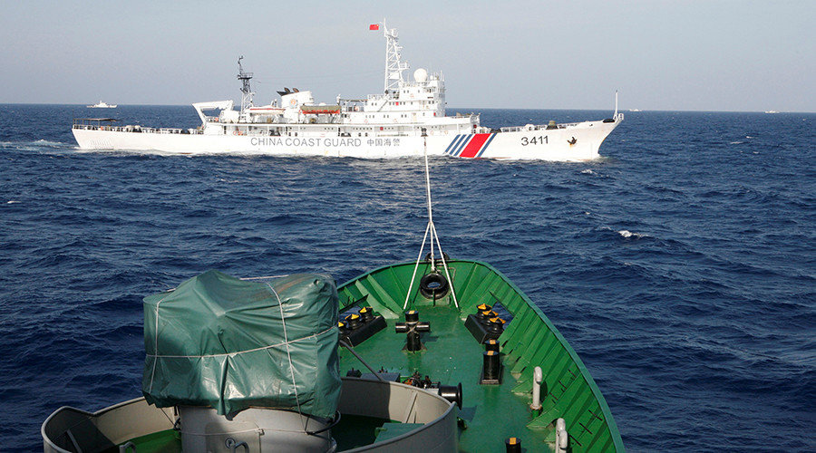  Chinese Coast Guard is seen near a ship of the Vietnam Marine Guard in the South China Sea