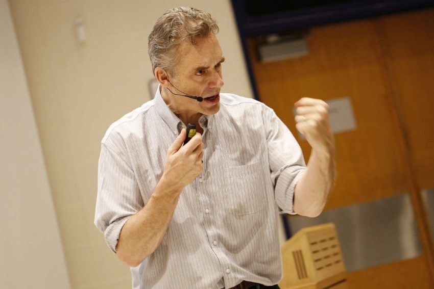 Jordan Peterson during a lecture this week at the University of Toronto. He has hired professional videographers -- who gave him the microphone -- with financing received from Internet supporters.
