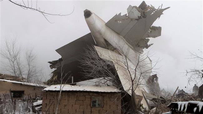 Plane debris is seen at the crash site of a Turkish cargo jet near Kyrgyzstan’s Manas airport, outside Bishkek, January 16, 2017