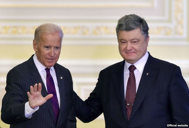 Click to enlarge U.S. Vice President Joe Biden (left) waves after a joint press conference with Ukrainian President Petro Poroshenko in Kyiv on January 16