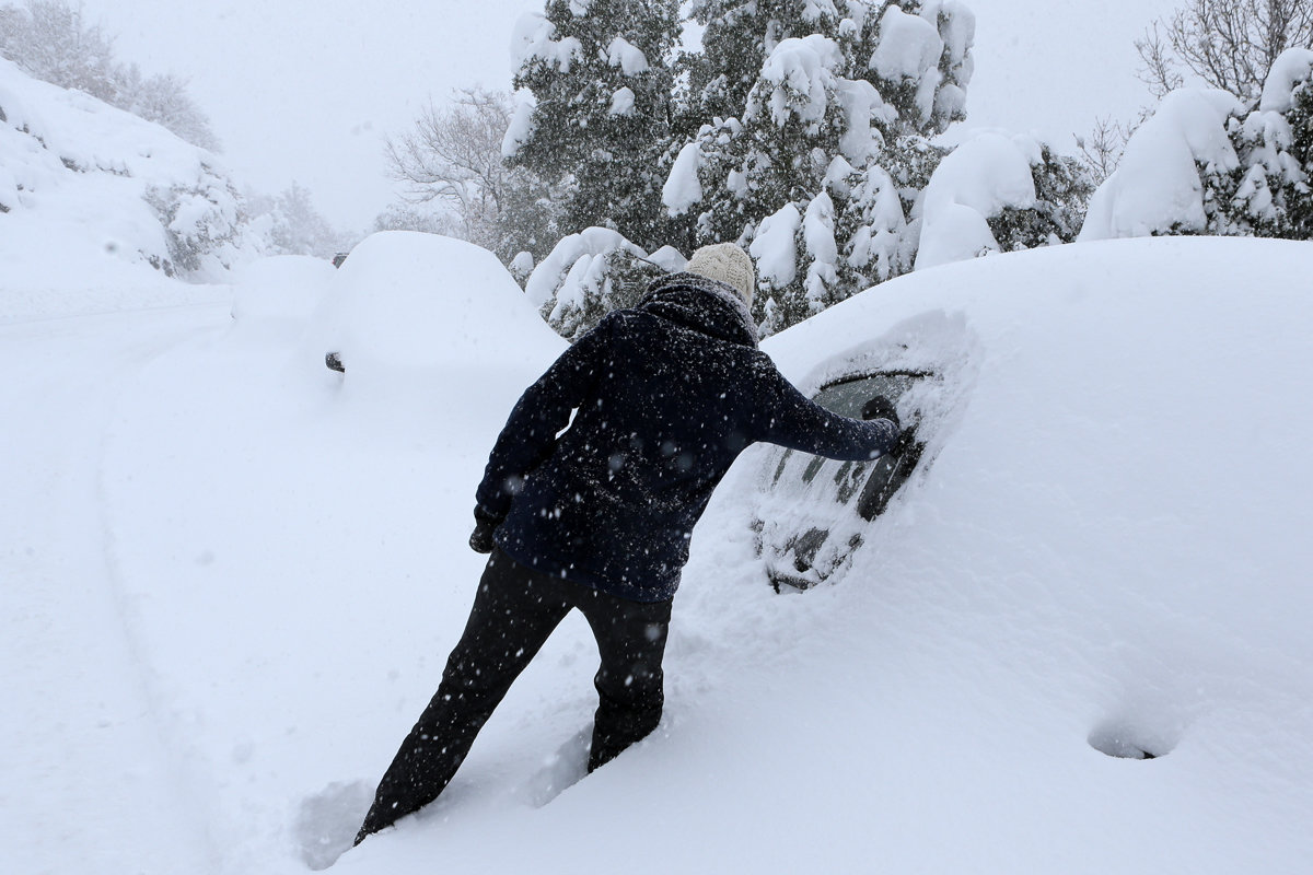 Snow covered car in Corte, Corsica