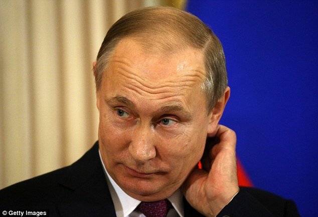 Click to enlarge putin scratching neck