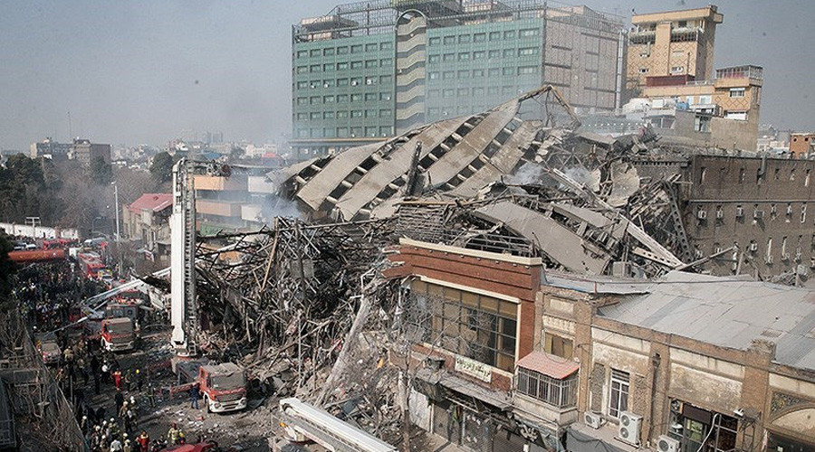 Click to enlarge Collapsed building in Tehran