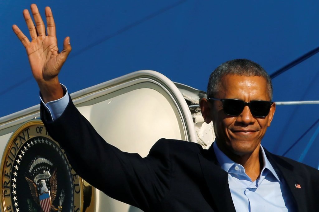 Click to enlarge Obama waves goodbye
