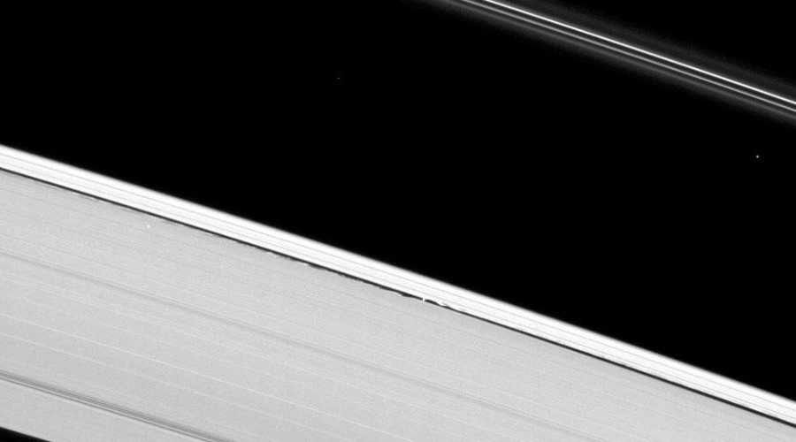 Click to enlarge Moon in Saturn's rings