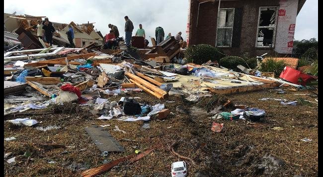 Click to enlarge Tornado damage