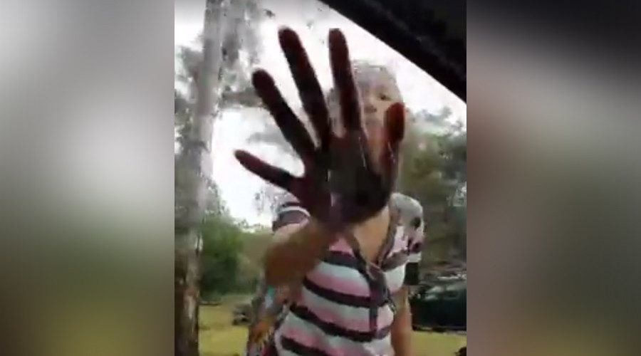 Woman attacking muslim couple
