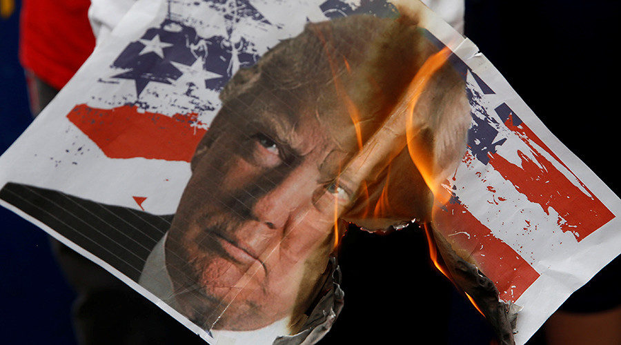 Trump poster burning