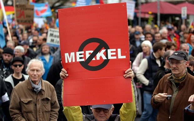Click to enlarge germany merkel protest