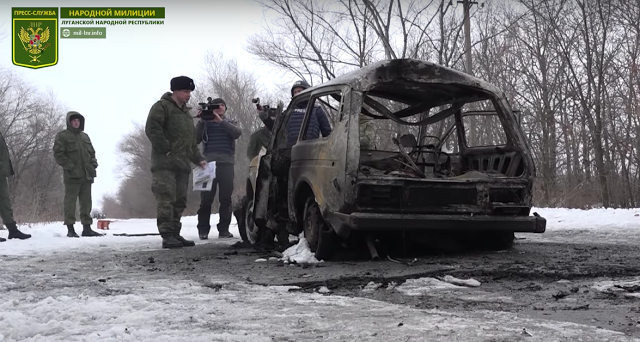 Click to enlarge Car demolished by wire-guided anti-tank missile in Dolgoye, Ukraine