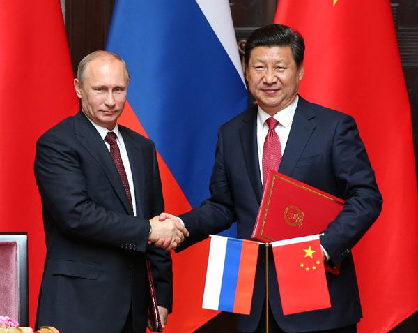 Click to enlarge Presidents Vladimir Putin and Xi Jinping