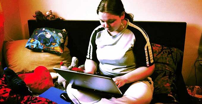 Click to enlarge girl on laptop