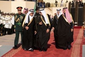 King Salman of Saudi Arabia and his entourage arrive to greet President Barack Obama and First Lady Michelle Obama at King Khalid International Airport in Riyadh, Saudi Arabia, Jan. 27, 2015
