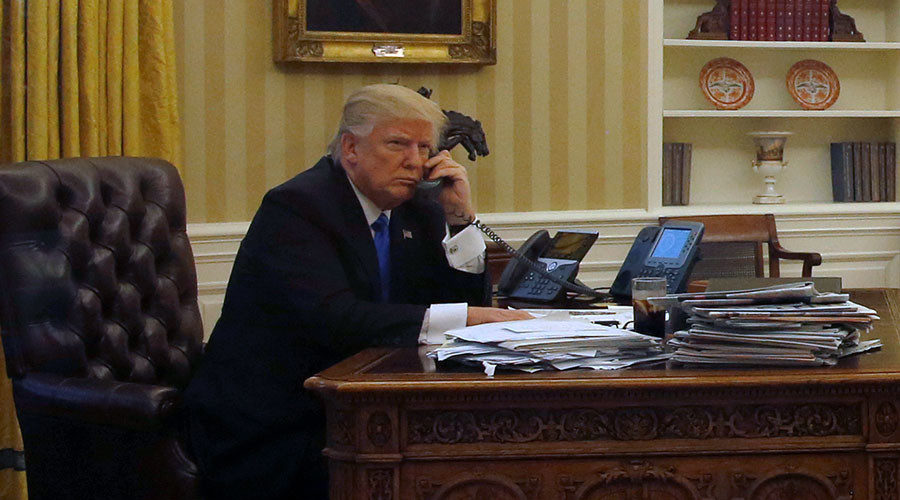 Click to enlarge Donald Trump on phone