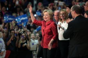 Former Secretary of State Hillary Clinton with former U.S. Congresswoman Gabrielle Giffords and astronaut Mark Kelly speaking with supporters at a campaign rally at Carl Hayden High School in Phoenix, Arizona. March 21, 2016