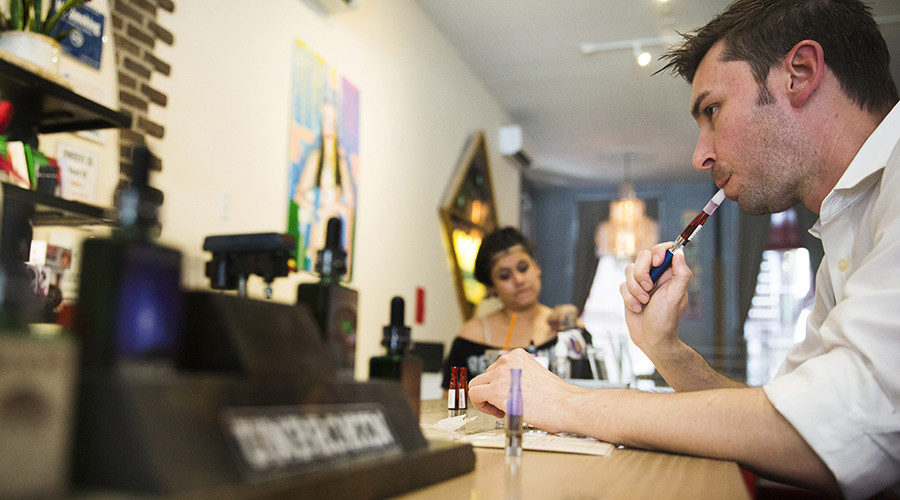 man smoking e-cigarette