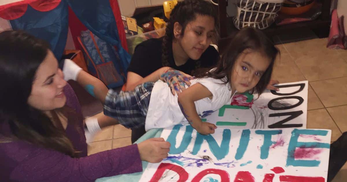 Click to enlarge Melanie Villela and her children